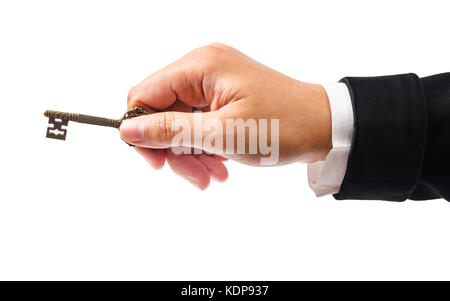 Businessman in a black suit which gives the key. Isolated on white background, Save clipping path. Stock Photo