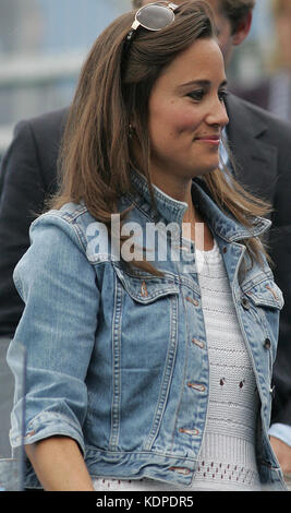 LONDON, ENGLAND - JUNE 09: Pippa Middleton with George Percy leaves centre court as rain delays play during the Men's Singles third round match between Andy Roddick of the United States and Kevin Anderson of South Africa on day four of the AEGON Championships at Queens Club.  Now that Pippa Middleton has parted from her banker boyfriend, handsome former cricketer Alex Loudon, the arduous task of consoling Her Royal Hotness appears to have fallen to an extremely eligible young bachelor: one George Percy.  on June 9, 2011 in London, England  People:  Pippa Middleton George Percy  Transmission Re Stock Photo