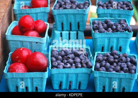 Baskets filled with Plums and Blueberries Stock Photo