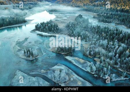 Beijing, China. 14th Oct, 2017. Photo taken on Oct. 14, 2017 shows the autumn scenery of the Kanas scenic area in northwest China's Xinjiang Uygur Autonomous Region. Credit: Liu Xu/Xinhua/Alamy Live News Stock Photo