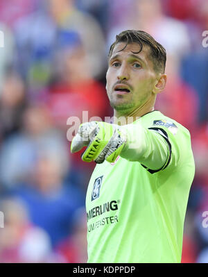 Mainz, Germany. 14th Oct, 2017. Mainz's goalkeeper René Adler in action during the German Bundesliga soccer match between 1. FSV Mainz 05 and Hamburger SV in the Opel Arena stadium in Mainz, Germany, 14 October 2017. Credit: Arne Dedert/dpa/Alamy Live News Stock Photo