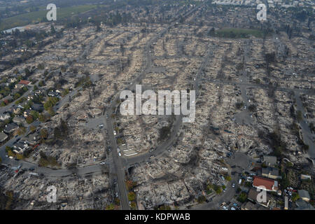 The remains of a housing development after fires swept through the neighborhood destroying some homes but leaving others intact October 14, 2017 in Santa Rosa, California. Stock Photo