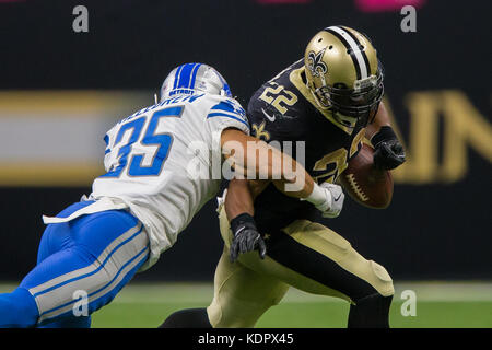 New Orleans, USA. 15th Oct, 2017. Detroit Lions strong safety Miles Killebrew (35) knocks the ball from New Orleans Saints running back Mark Ingram (22) during the second half of the game between the Detroit Lions and the New Orleans Saints at the Mercedes-Benz Superdome in New Orleans, LA. New Orleans Saints won 52-38. Credit: Cal Sport Media/Alamy Live News Stock Photo