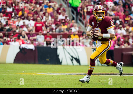 Landover, Maryland, USA. 15th Oct, 2017. Washington Redskins quarterback Kirk Cousins (8) scrambles during the NFL game between the San Francisco 49ers and the Washington Redskins at FedExField in Landover, Maryland. Scott Taetsch/CSM/Alamy Live News Stock Photo