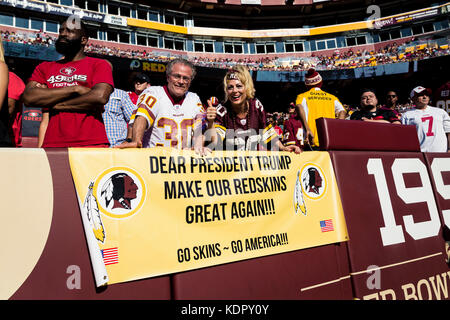 Landover, Maryland, USA. 15th Oct, 2017. Washington Redskins fans celebrate by a sign during the NFL game between the San Francisco 49ers and the Washington Redskins at FedExField in Landover, Maryland. Scott Taetsch/CSM/Alamy Live News Stock Photo