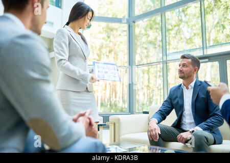 Holding Business Presentation Stock Photo