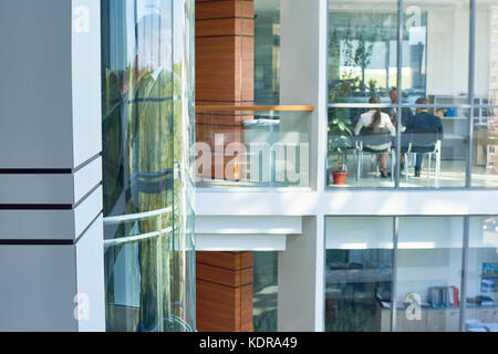 Interior of Busy Office Building Stock Photo