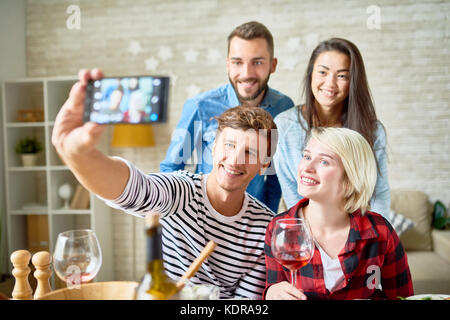 Happy Young People Posing for Selfie Stock Photo