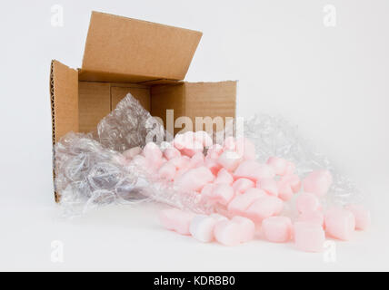 Open cardboard shipping box with packing materials. Stock Photo