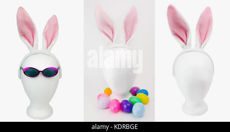 Styrofoam mannequin heads with Easter decorations: sunglasses, colorful plastic eggs, and furry pink bunny ears. Isolated. Stock Photo