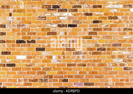 Yellow brick wall seamless background Stock Photo