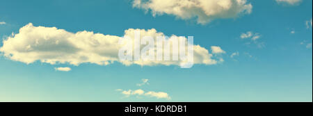 Long wide banner with blue sky and clouds background Stock Photo