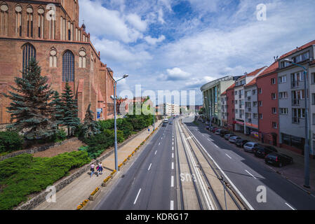 Cardinal Stefan Wyszynski Street and The Cathedral Basilica of St. James the Apostle in Szczecin, Poland Stock Photo