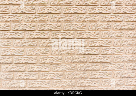 Wall brick mold slats closeup pastel color  beige cream paint detail texture full frame background. Stock Photo