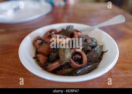 traditional food squid adobo, Philippines Stock Photo