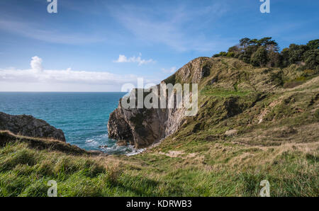 Stair Hole near Lulworth Cove in Dorset showing the folded limestone strata known as Lulworth crumple. England, UK Stock Photo