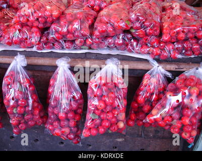 Ver-o-peso market, acerola fruits in transparent plastic bags Stock Photo