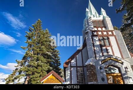 St Pauls Korean Presbyterian Church Facade Exterior. Famous City Main Street Landmark, Banff National Park Canadian Rocky Mountains Blue Sky Sunny Day Stock Photo