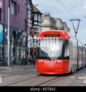 Red Incentro AT6/5 model Tram, Goldsmith's street, Nottingham Stock Photo