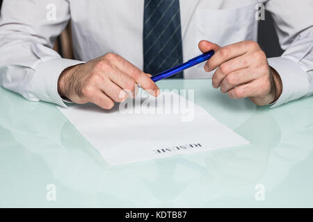 Cropped View of Person Completing Application Form Stock Photo
