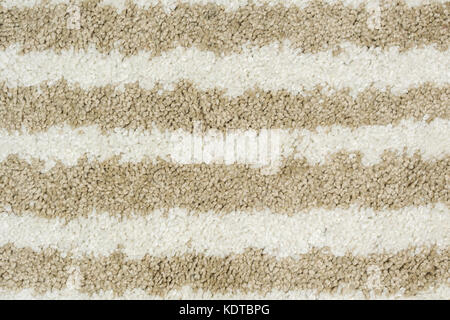 closeup of carpet with brown and white horizontal pattern Stock Photo