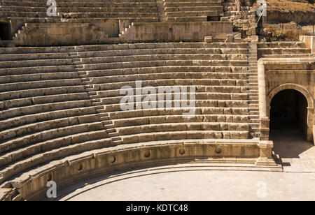 Seating and arched entrance, South Theatre amphitheatre, Roman city of Jerash, ancient Gerasa, archaeological site, Jordan, Middle East Stock Photo