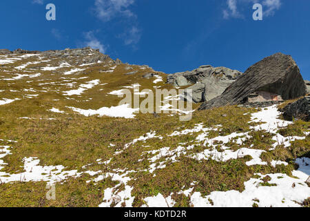 Mountain side with clear blue sky on Kaiser Franz Josef glacier. Grossglockner High Alpine Road in Austrian Alps. Stock Photo