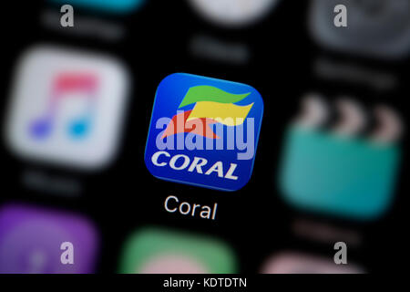 A close-up shot of the logo representing the Coral betting app icon, as seen on the screen of a smart phone (Editorial use only) Stock Photo