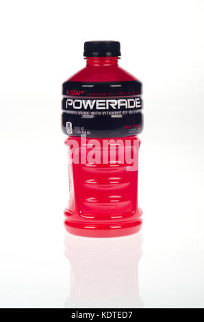 Plastic bottle of fruit punch flavored Powerade sports energy drink  by the Coca Cola Company on white background USA Stock Photo