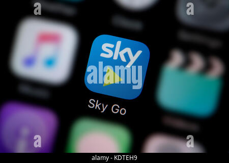 A close-up shot of the logo representing the Sky Go app icon, as seen on the screen of a smart phone (Editorial use only) Stock Photo