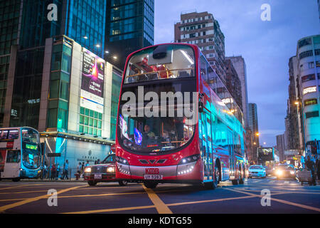 Mong Kok, Kowloon, Hong Kong - OCTOBER 14, 2017 : Public modes of transportation on the Argyle Street and Nathan Road crossing in Mong Kok, Hong Kong. Stock Photo