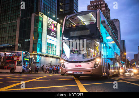 Mong Kok, Kowloon, Hong Kong - OCTOBER 14, 2017 : Public modes of transportation on the Argyle Street and Nathan Road crossing in Mong Kok, Hong Kong. Stock Photo