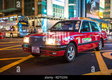 Mong Kok, Kowloon, Hong Kong - OCTOBER 14, 2017 : Public modes of transportation on the Argyle Street and Nathan Road crossing in Mong Kok, Hong Kong. Stock Photo