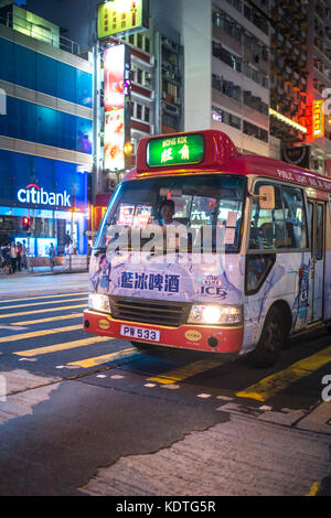 Mong Kok, Kowloon, Hong Kong - OCTOBER 14, 2017 : Public modes of transportation on the Argyle Street and Nathan Road crossing in Mong Kok, Hong Kong. Stock Photo