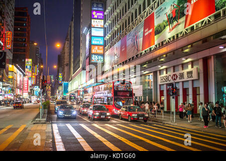 Mong Kok, Kowloon, Hong Kong - OCTOBER 14, 2017 : Public modes of transportation on the Argyle Street and Nathan Road crossing in Mong Kok, Hong Kong. Stock Photo