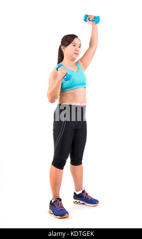 asian chubby woman holding dumbbell for exercising Stock Photo