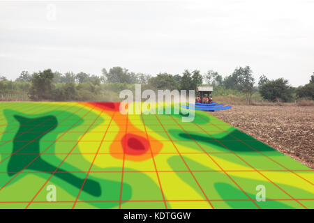 smart agriculture concept, farmer use infrared in tractor with high definition soil mapping while planting,conduct deep soil scan during a tillage pas Stock Photo