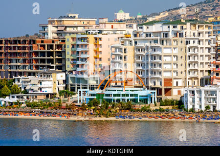 Saranda Bay beach and colorful hotels, Sarande, Vlore County, Albania. Stock Photo