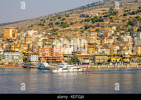 Saranda Bay yacht and city skyline, Albania capital of Albanian Riviera, Sarande, Vlore County, Albania. Stock Photo