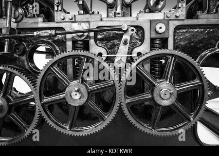 Industrial machine cogs in black and white. Stock Photo