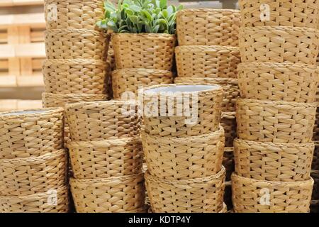 Stack of Decorative Storage Basket Made of Water Hyacinth for Storage Compartment. Stock Photo