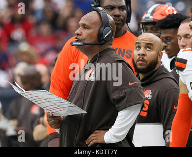 Cleveland Browns head coach Hue Jackson, left, visits Dylan Sutcliffe,  right, accompanied by his father Derek Sutcliffe, before an NFL football  game between the Cleveland Browns and the Baltimore Ravens, Sunday, Oct.