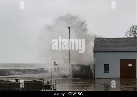 Schull, Ireland 16th Oct, 2017.  Ex-Hurricane Ophelia hits Schull, Ireland with winds of 80kmh and gusts of 130kmh.  Huge waves hit Schull pier making many parts of the coast no-go areas. Credit: Andy Gibson/Alamy Live News. Stock Photo