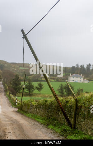 Schull, Ireland 16th Oct, 2017. Ex-Hurricane Ophelia caused widespread structural damage when she hit Ireland on Monday. This telegraph pole in Leamcon, near Schull, was on the verge of falling. Credit: Andy Gibson/Alamy Live News. Stock Photo