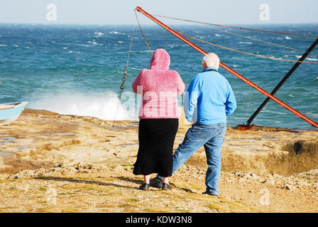 Portland, Dorset, UK. 16th Oct, 2017. People visit to the Isle of Portland to witness the waves created by storm Ophelia Credit: stuart fretwell/Alamy Live News Stock Photo