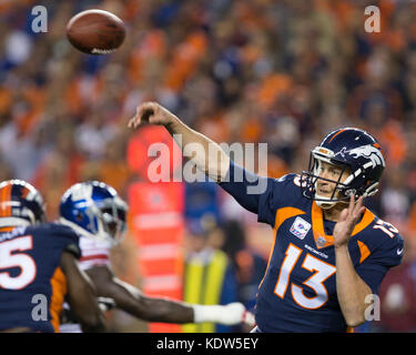 October 15, 2017: Denver Broncos quarterback Trevor Siemian (13) passes the ball during the first quarter of an NFL week 6 matchup between the New York Giants and the Denver Broncos at Sports Authority Field at Mile High Stadium Denver CO, Scott D Stivason/Cal Sport Media Stock Photo