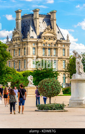 The Jardin des Tuileries (Tuileries Garden), and the beautiful architecture of the Louvre is on display in the background. Paris, France Stock Photo