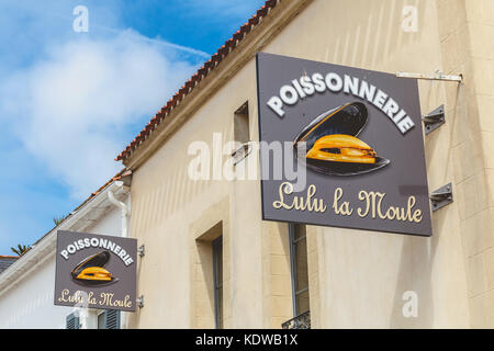 NOIRMOUTIER, FRANCE - July 03, 2017 : sign of a fish shop or it is written in French - fishmonger Lulu the mussel Stock Photo