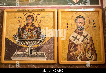 Detail of religious wall mosaics in Greek Orthodox Basilica Saint George, Madaba, Jordan, Middle East, with Virgin Mary and Jesus Christ Stock Photo