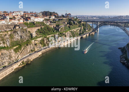 View from Infante D. Henrique Bridge on a Maria Pia Bridge old railway bridge over Douro river between Porto (L) and Vila Nova de Gaia, Portugal Stock Photo